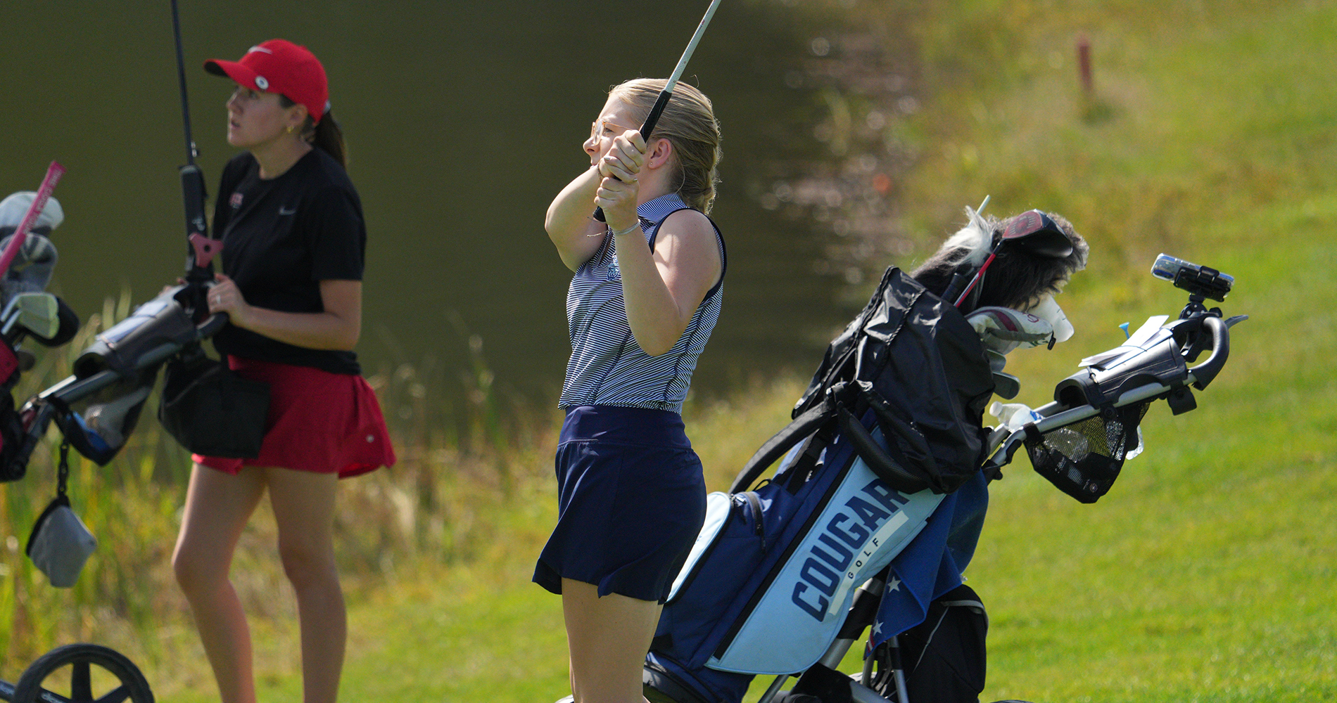 Jacqueline Gieseler swings the golf club in the team's tournament 